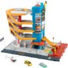 Matchbox Toy Vehicles & Playset, Transportation Center with 5 Levels, Kid- & Car-Activated Features, 1:64 Scale Taxi, Boat & Helicopter & Food Vendor